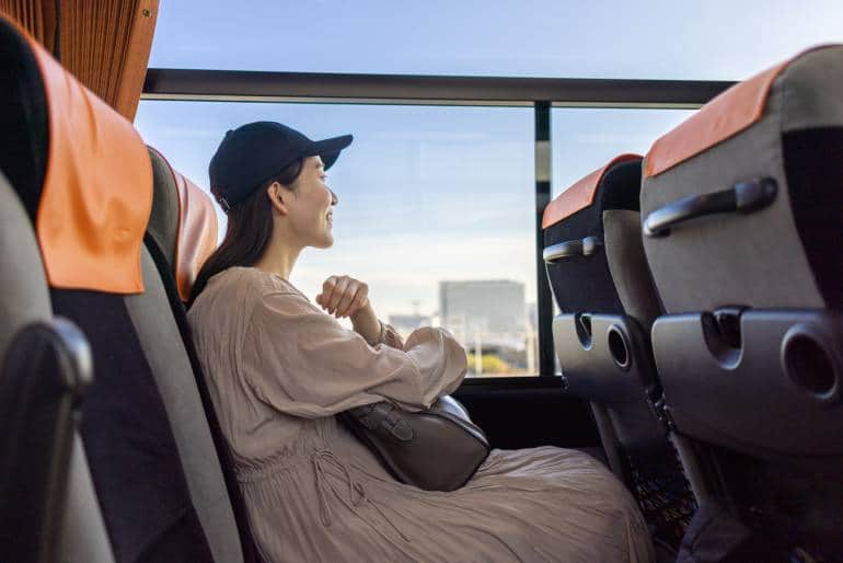young woman on bus in Japan